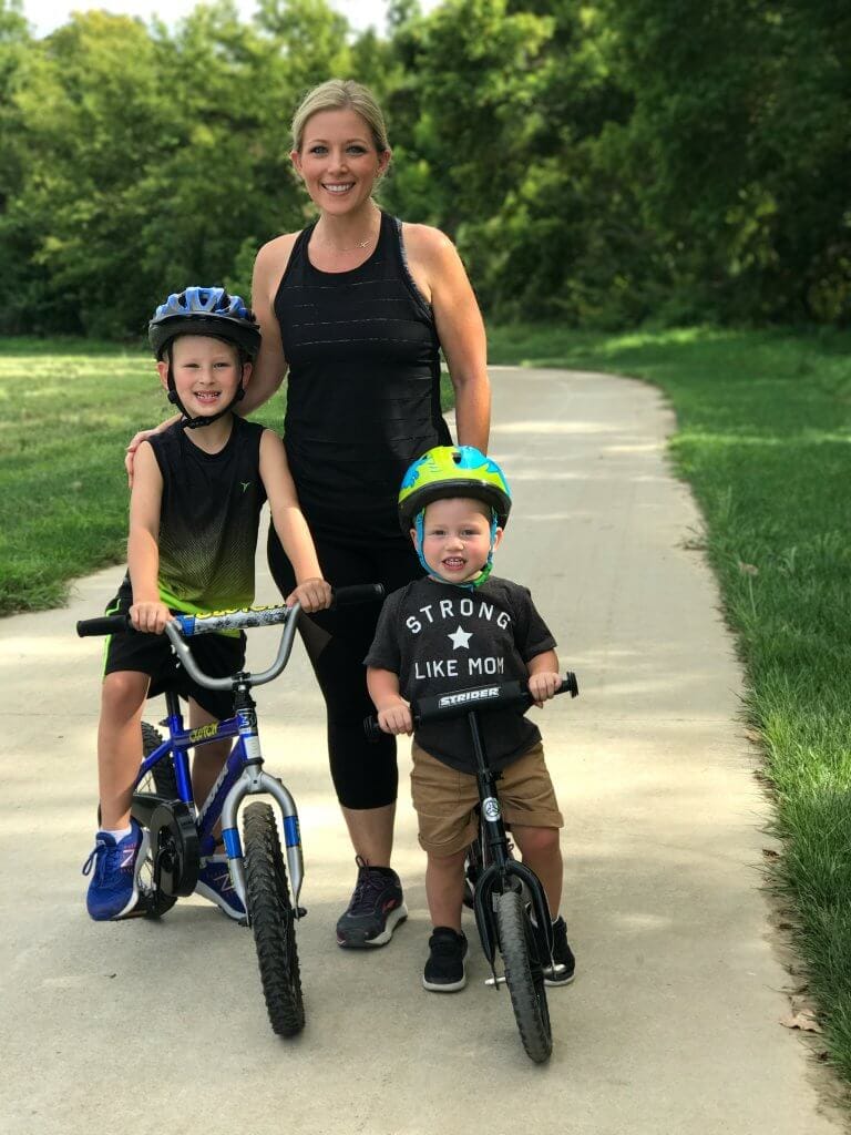 Mother and sons bike riding