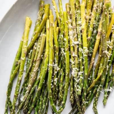 Oven Roasted Garlic Parmesan Asparagus is an easy and healthy vegetable to prepare that pairs with so many dishes!