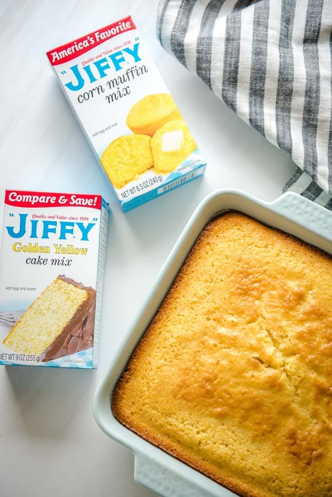 Two boxes of Jiffy mix and a pan of cornbread and a napkin