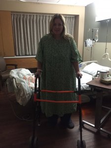 Woman using a walker after back surgery