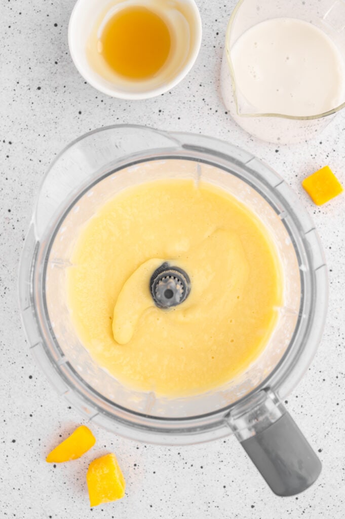 mango smoothie in the blender after It has been blended