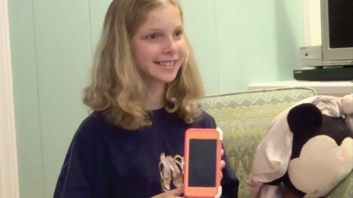 A girl with a smartphone features in Dove's "Cost of Beauty" short film