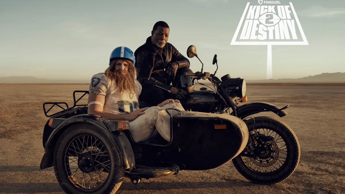 FanDuel Super Bowl campaign that shows NFL icon Rob Gronkowski in the sidecar of a motorcycle being driven by actor Carl Weathers.