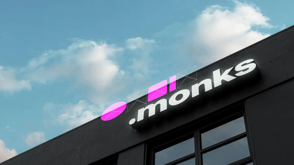 Monks logo on a building facade