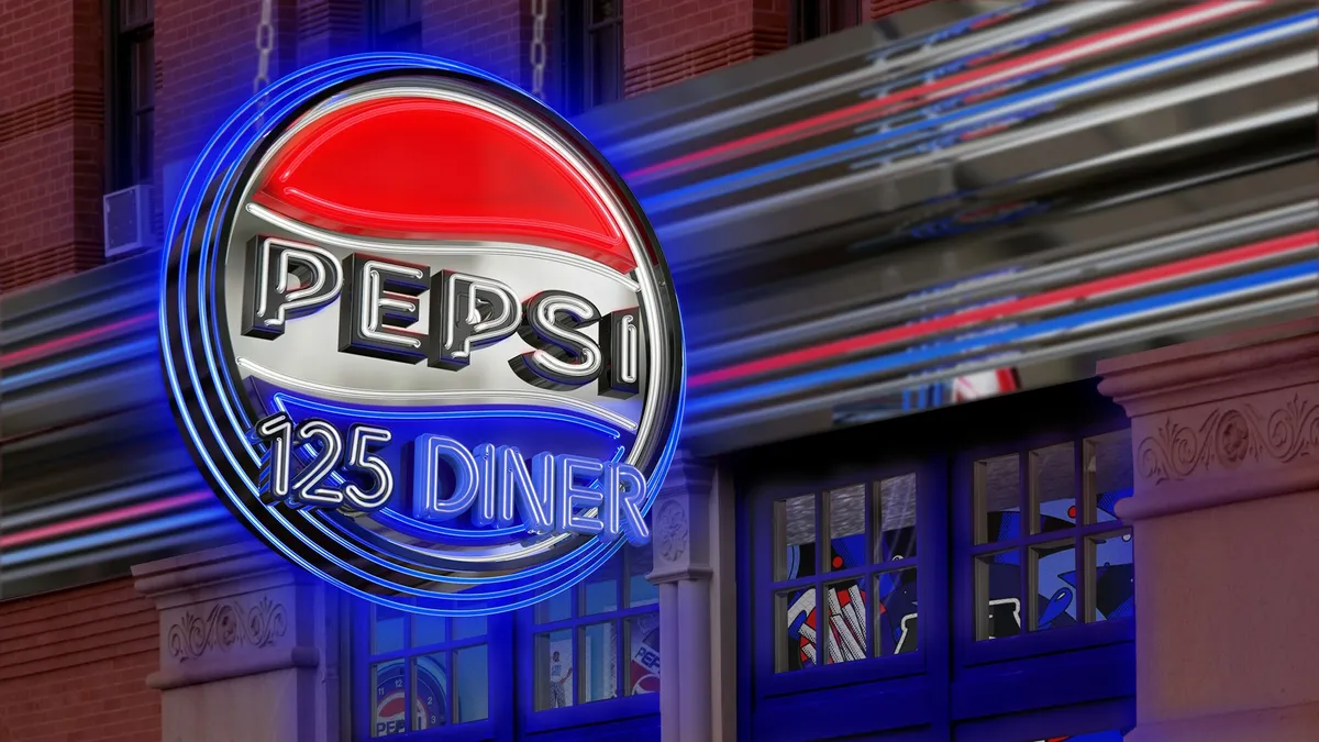 A neon sign over Pepsi's diner concept