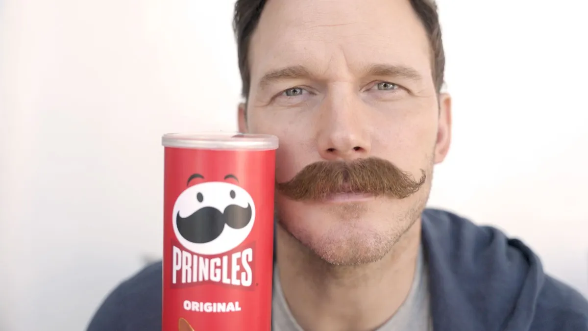 Pringles' 2024 Super Bowl ad teaser that sees Chris Pratt next to the Pringles can touting a mustache similar to the one on the Pringles can.